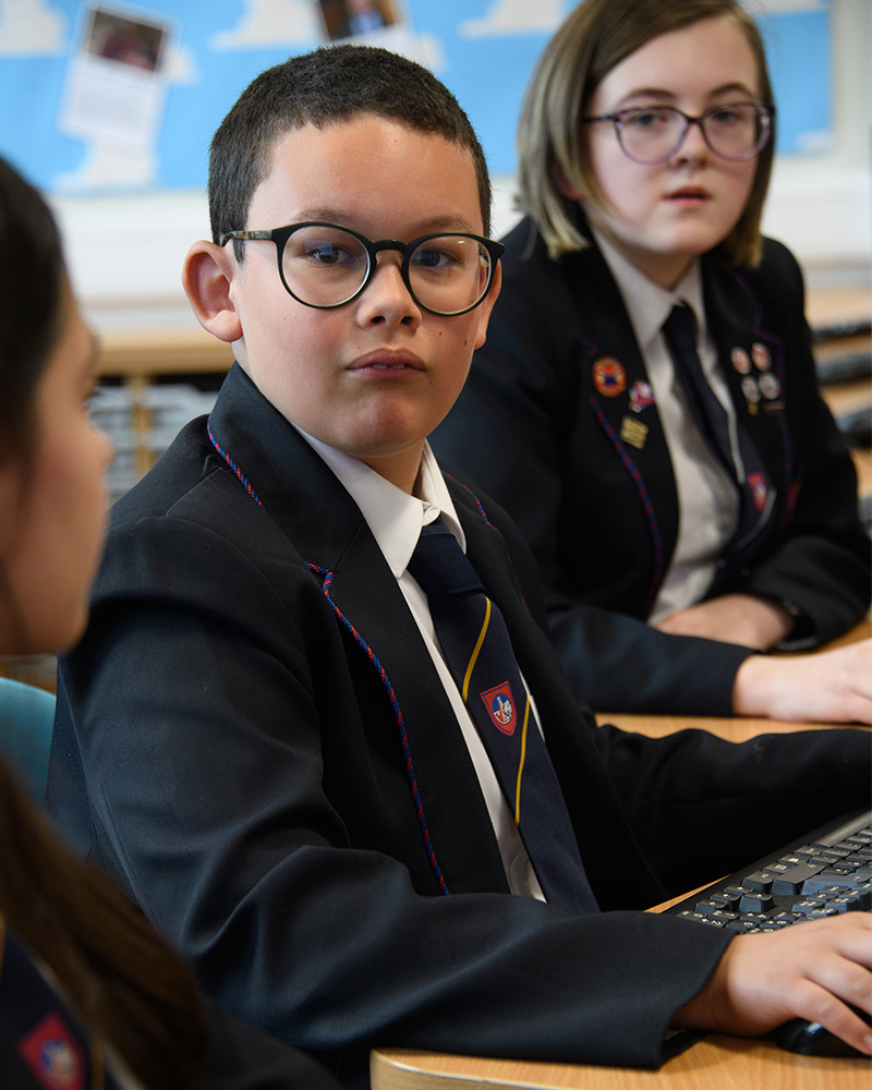 Boy in computer room